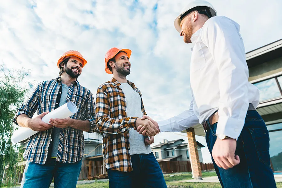 No employer or location restrictions! photo of architects working on an Alberta job site, thanks to the open work permit acquired for working in Canada with the help of Canadian Immigration Group